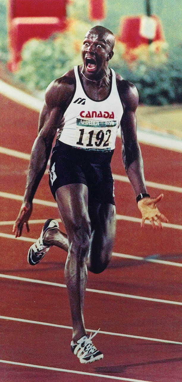 Donovan Bailey wins gold and sets 100-metre world record