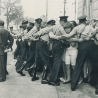 TS-084_Beatles fans held back by police.jpg